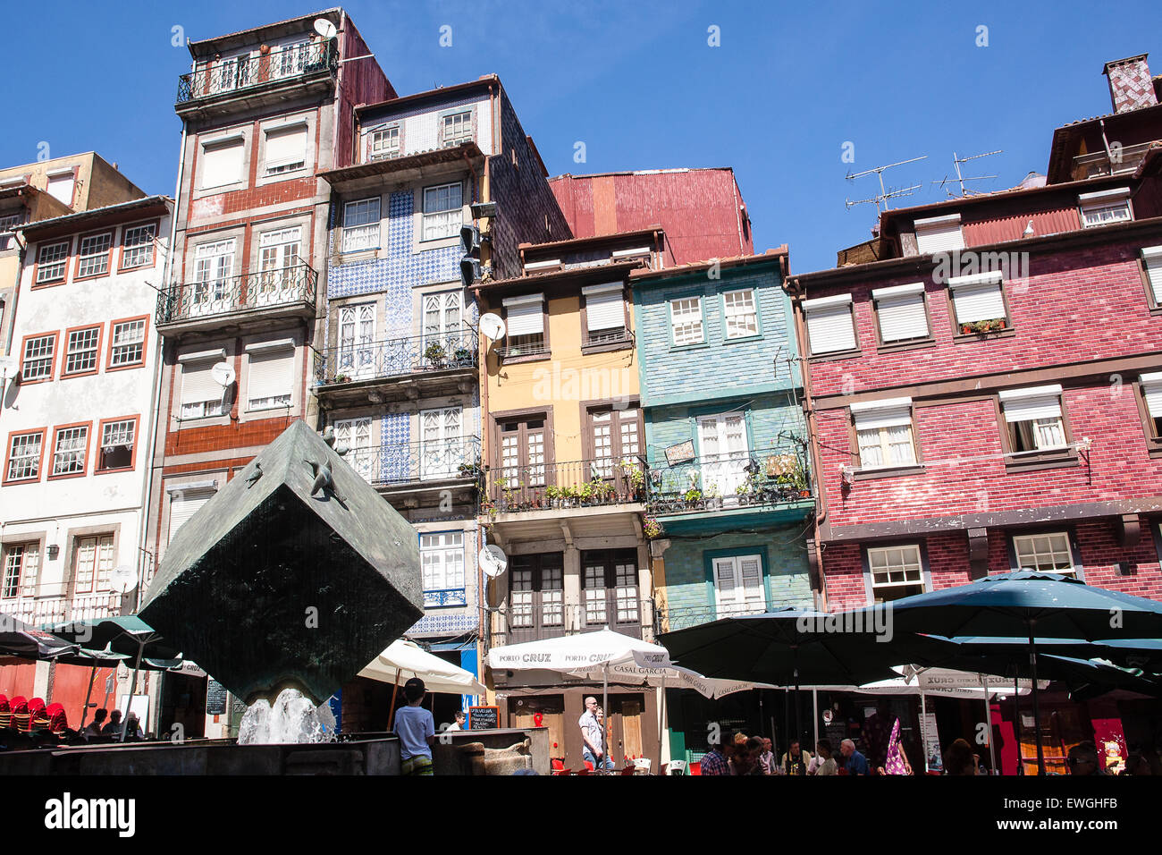 Cube statue tourists and tiles on houses at Ribeira Square (Praca da ...