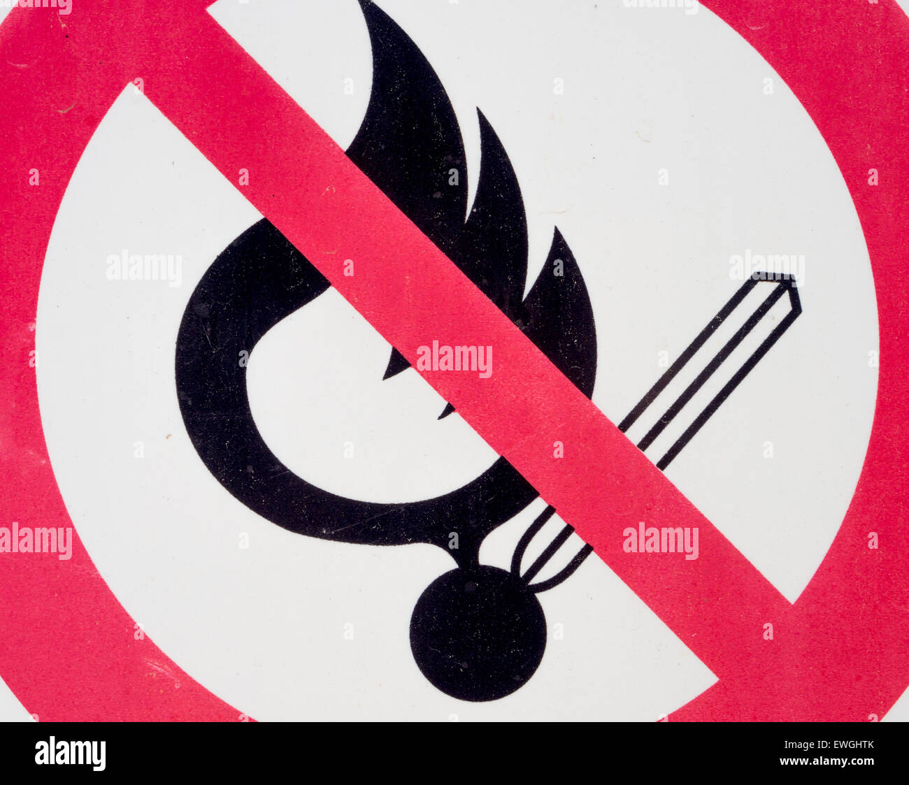 Particular of a sign prohibiting the lighting of flame. Stock Photo