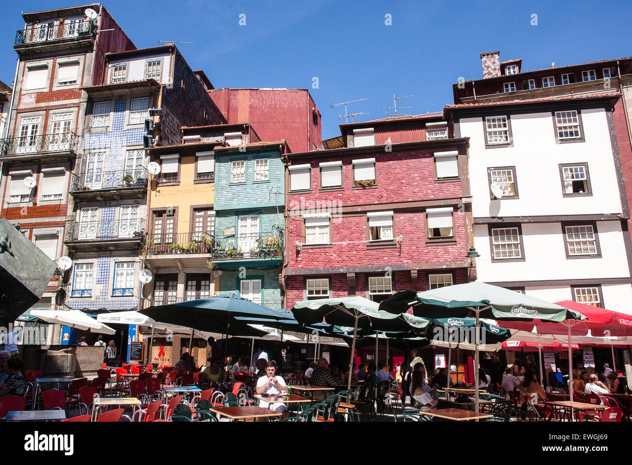Cube statue tourists and tiles on houses at Ribeira Square (Praca da ...
