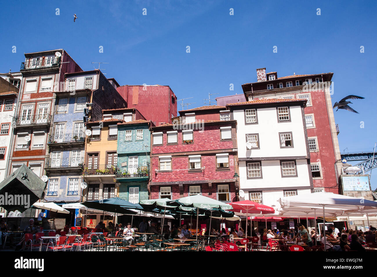 Cube statue tourists and tiles on houses at Ribeira Square (Praca da ...