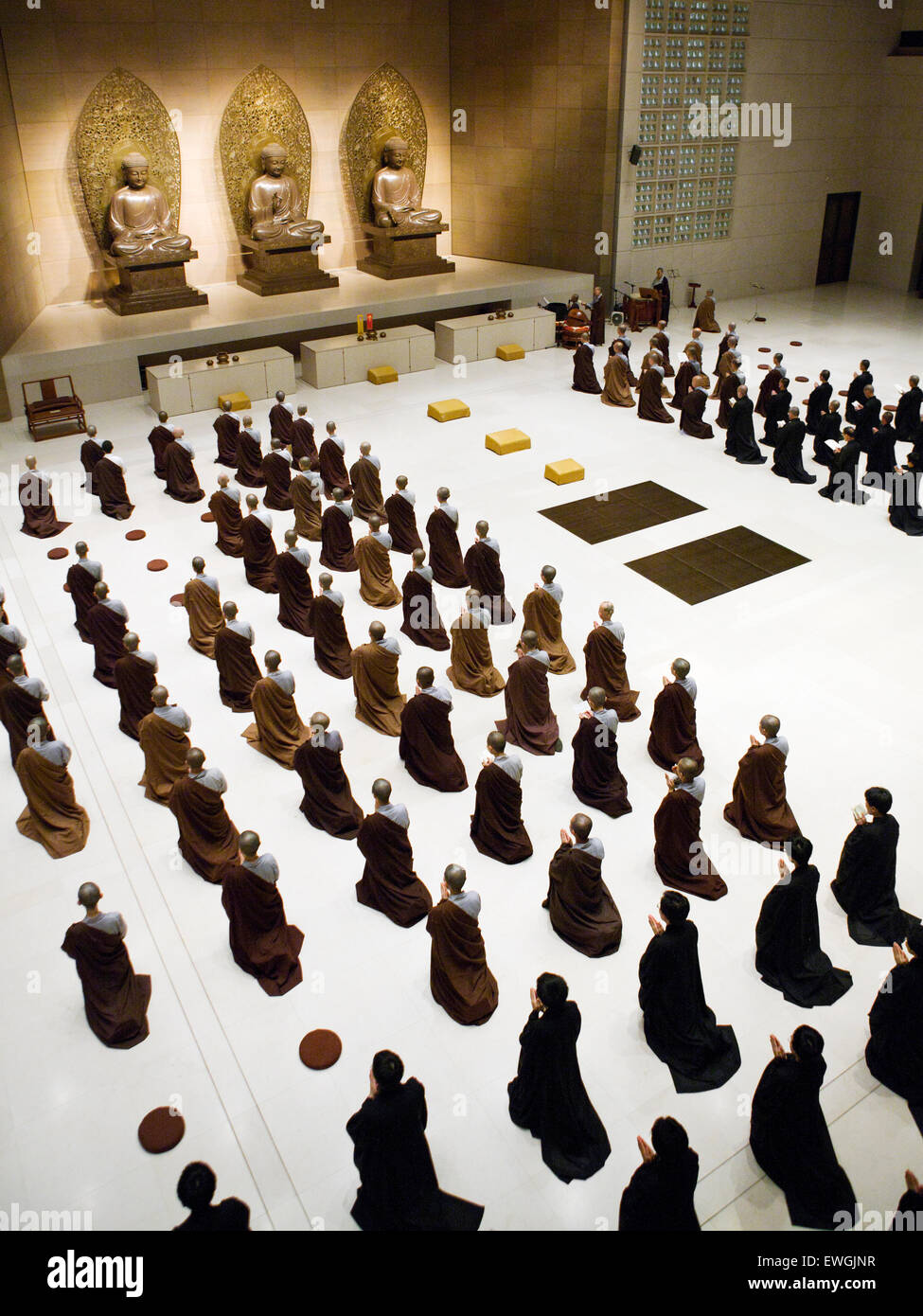 Buddhist monks pray and meditate at the Dharma Drum Mountain monastry. Sanjie Village, Jinshan