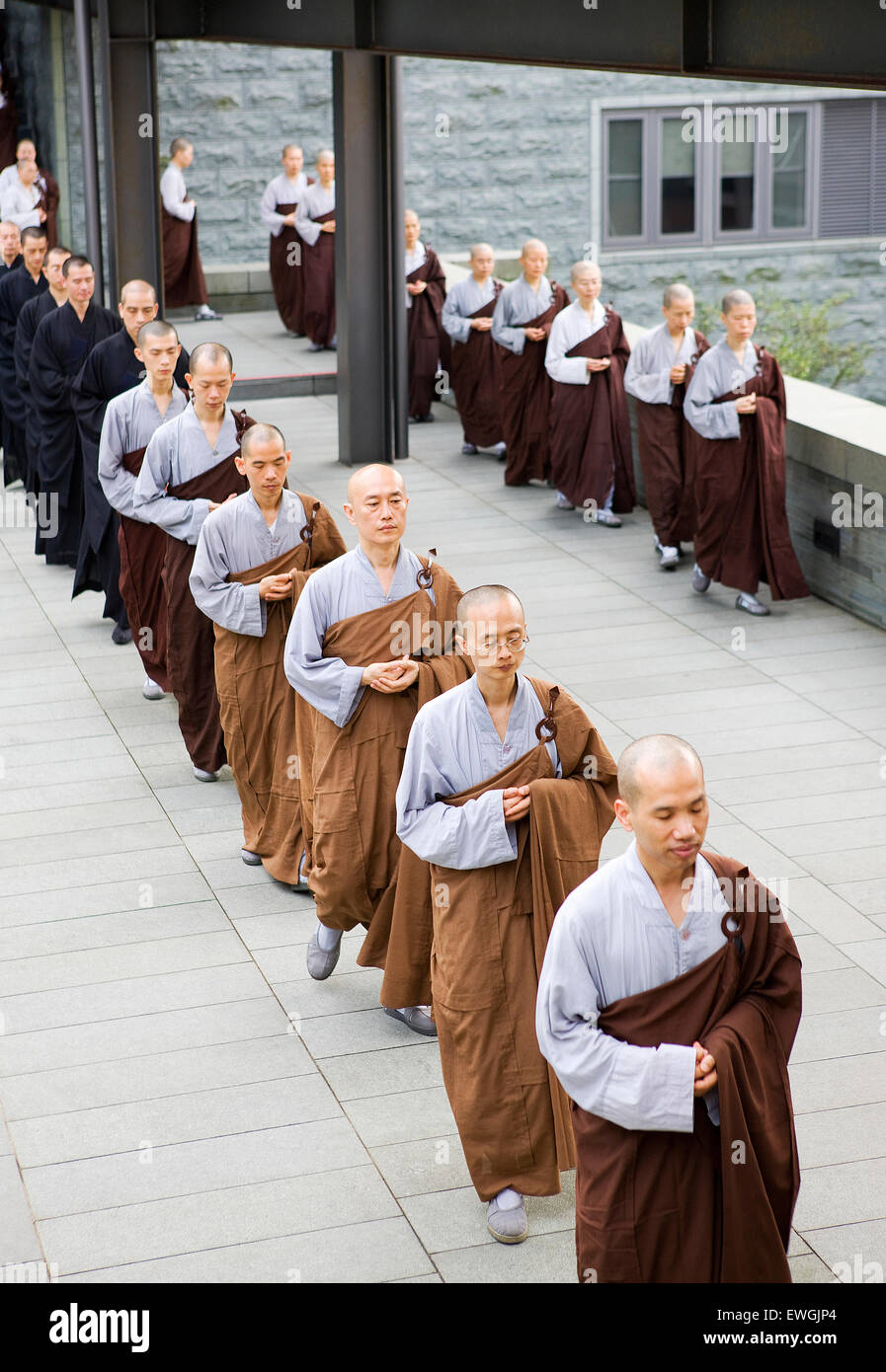 Buddhist monks pray and meditate at the Dharma Drum Mountain monastry. Sanjie Village, Jinshan, Taipei County, Taiwan , R.O.C. A Stock Photo