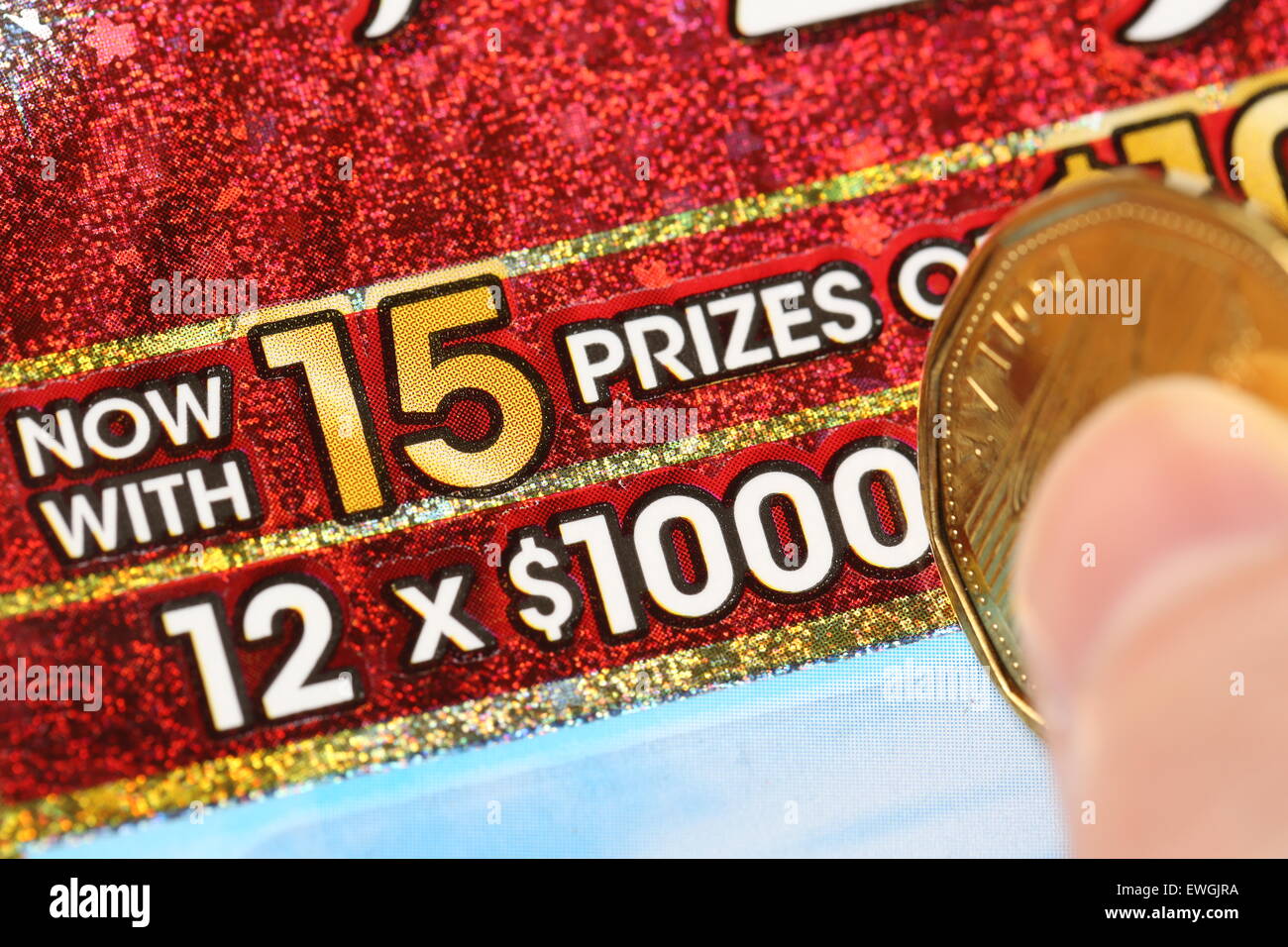 Coquitlam BC Canada June 04, 2015 Woman scratching lottery ticket
