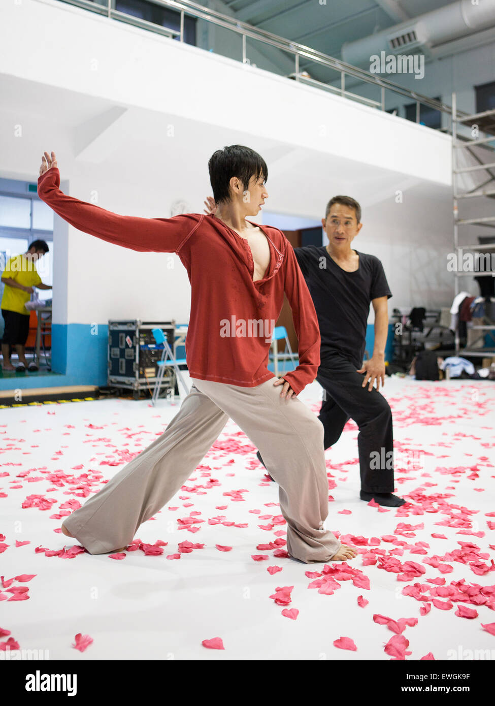 Choreographer Lin Hwai-min  instructs dancers with his Cloud Gate Dance Theater group at their rehearsal  space in Taipei. Stock Photo