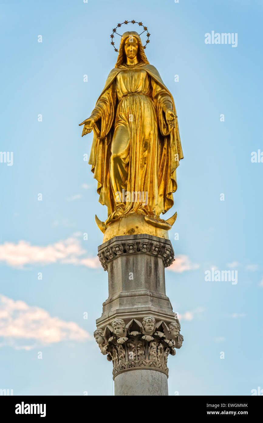 Virgin Mary golden statue Stock Photo Alamy