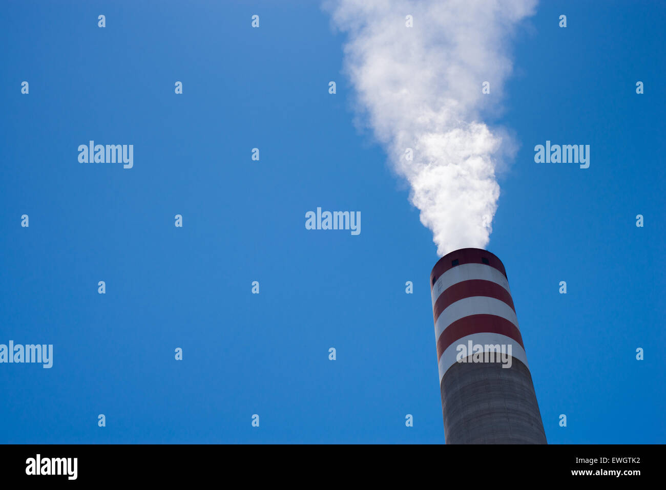 View of a smokestack at coal-fired Paiton Power Station in Probolinggo, East Java, Indonesia. Stock Photo