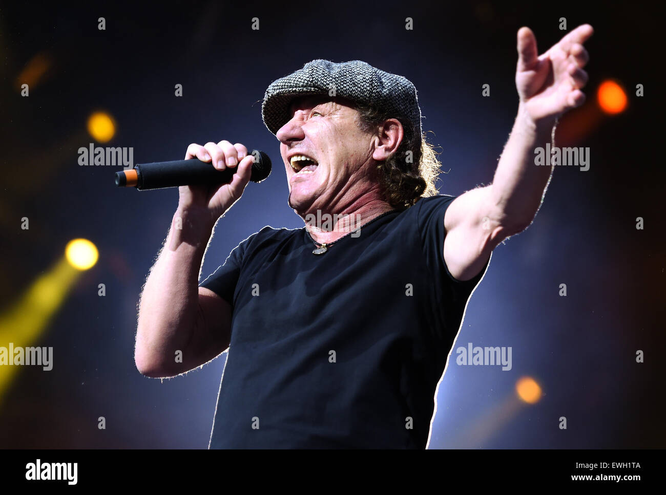 Berlin, Germany. 25th June, 2015. Singer Brian Johnson of Australian rock band AC/DC performs on stage during a concert at the Olympiastadion in Berlin, Germany, 25 June 2015. Photo: Britta Pedersen/dpa/Alamy Live News Stock Photo