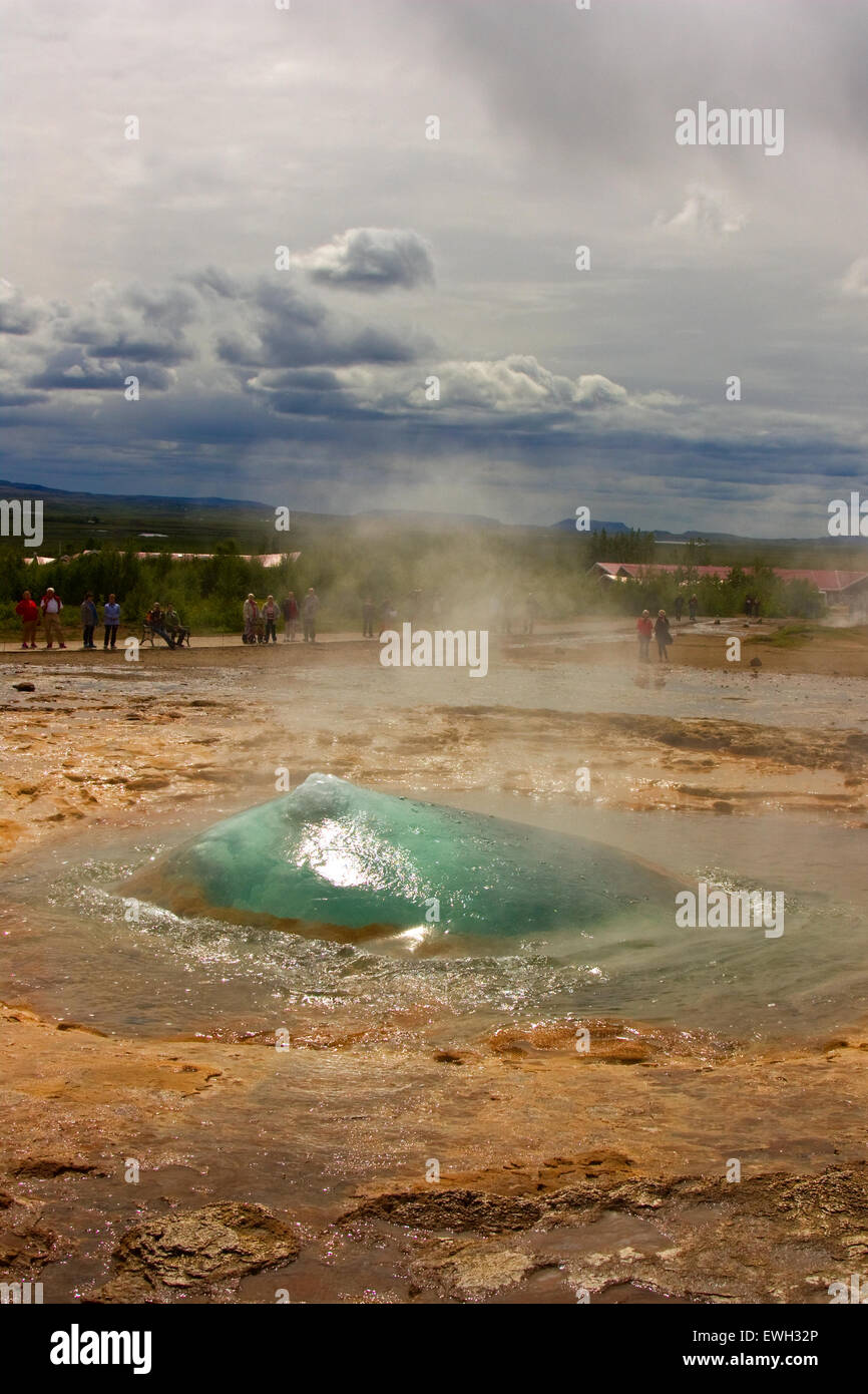 Bulging water of a geyser just before outburst Stock Photo