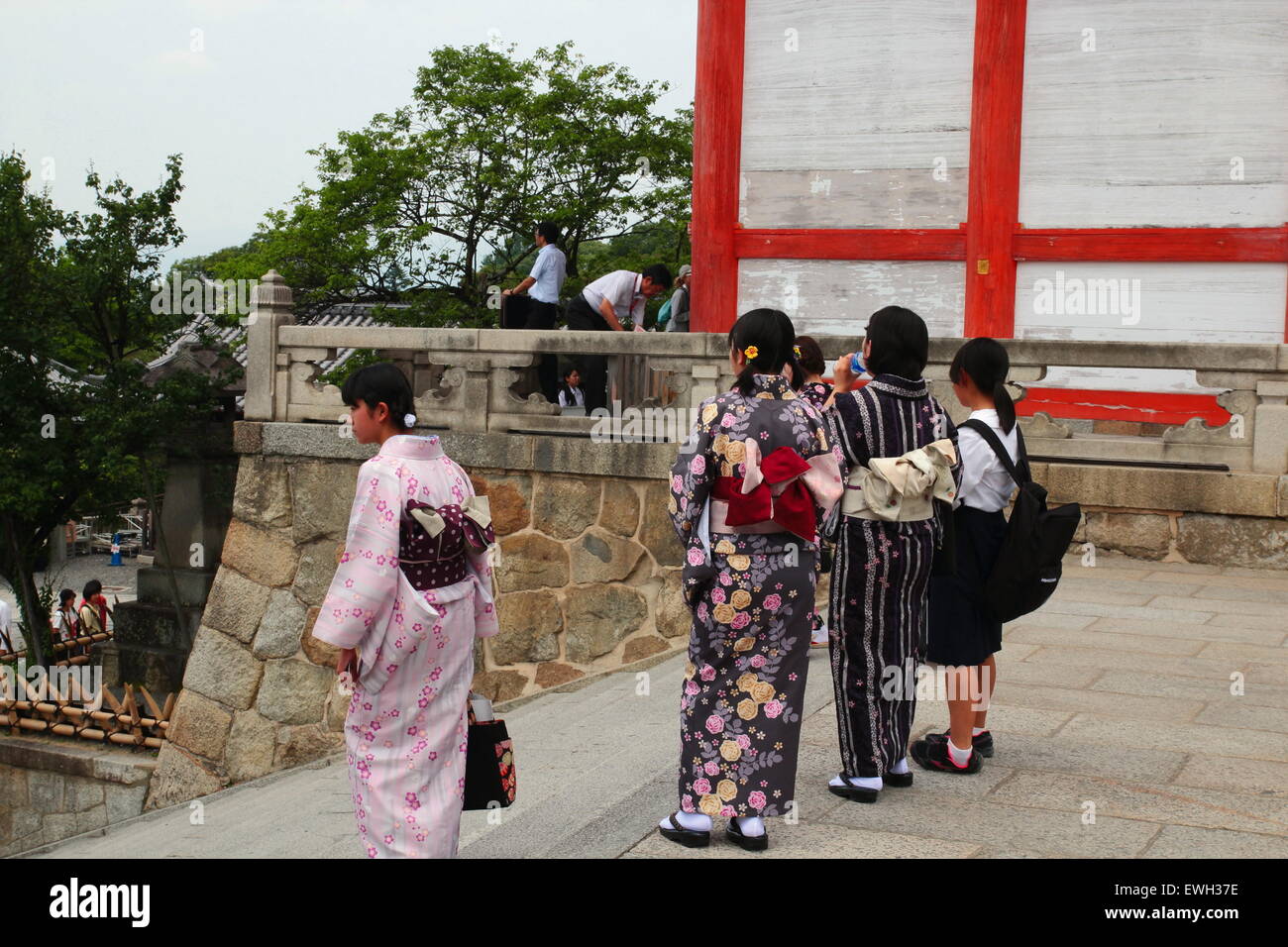 Four Japanese Girls in traditional Kimono in  Kiyomizu temple, Kyoto, Japan Stock Photo