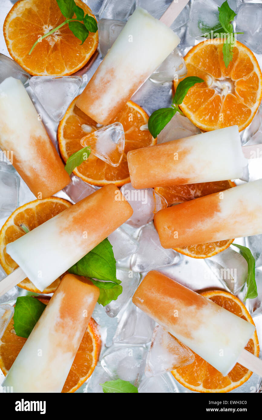 Homemade frozen yogurt cantaloupe popsicles Stock Photo Alamy