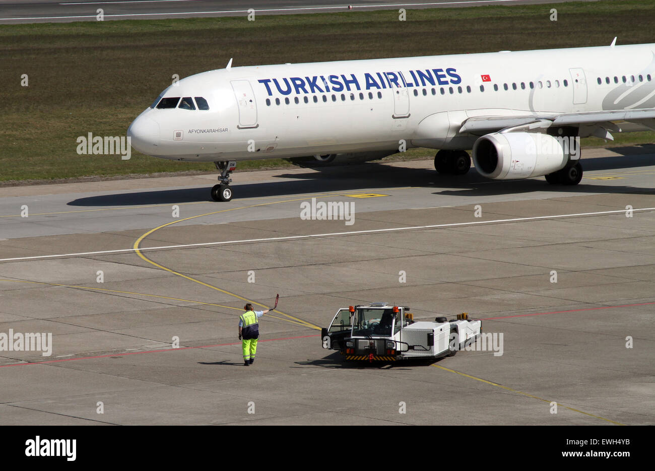 Berlin, Germany, ramp agent and Airbus A321 the airline Turkish Airlines Stock Photo