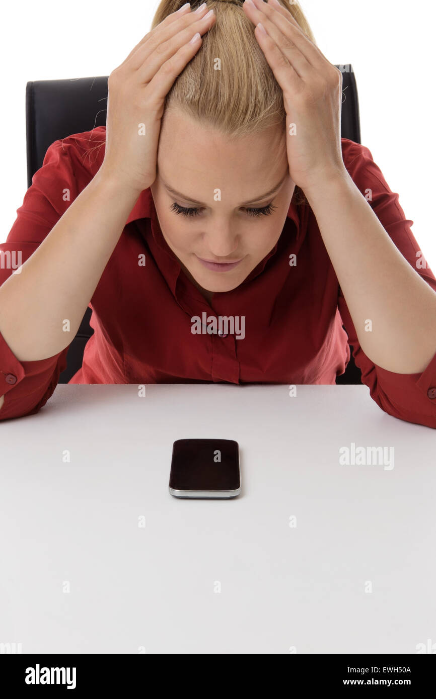 Woman waiting for phone to ring sad hi-res stock photography and images ...