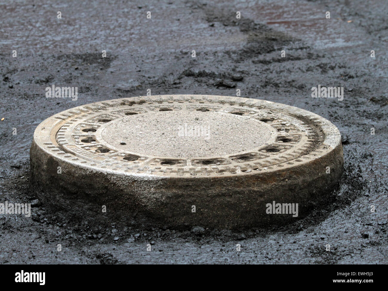 Berlin, Germany, at road works exposed manhole covers Stock Photo