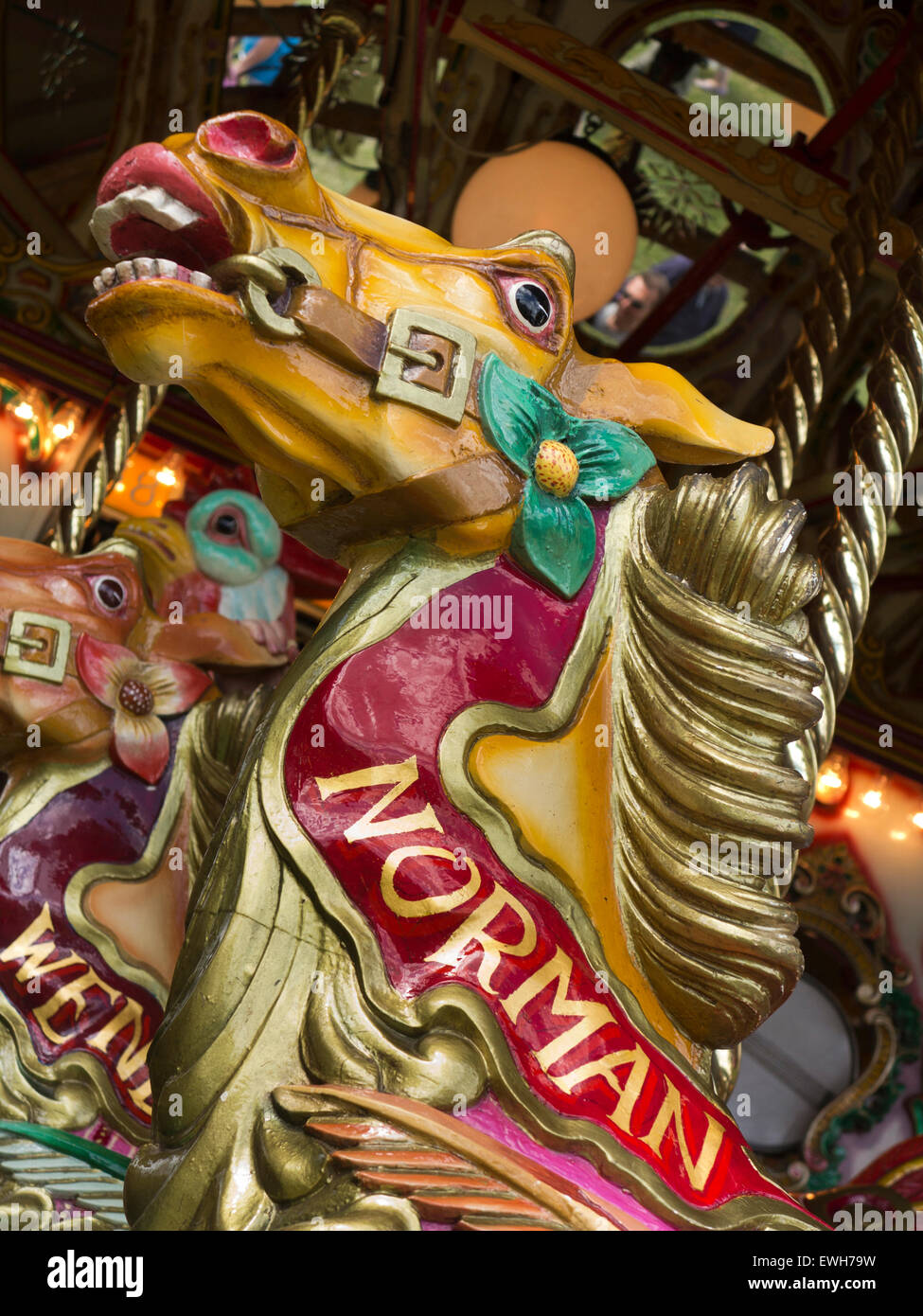 UK, England, Cheshire, Chelford, Astle Park Traction Engine Rally, traditional funfair, colourfully decorated carousel horse Stock Photo