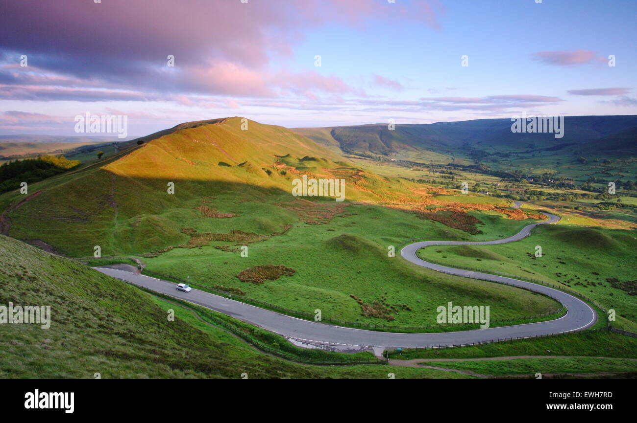 The winding B road to edale across the Hope valley that slices Mam Tor and Rushup Edge, Peak District, Derbyshire England UK Stock Photo