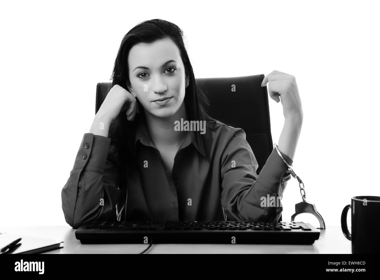 Woman Locked Up To Her Desk At Work Stock Photo 84587677 Alamy