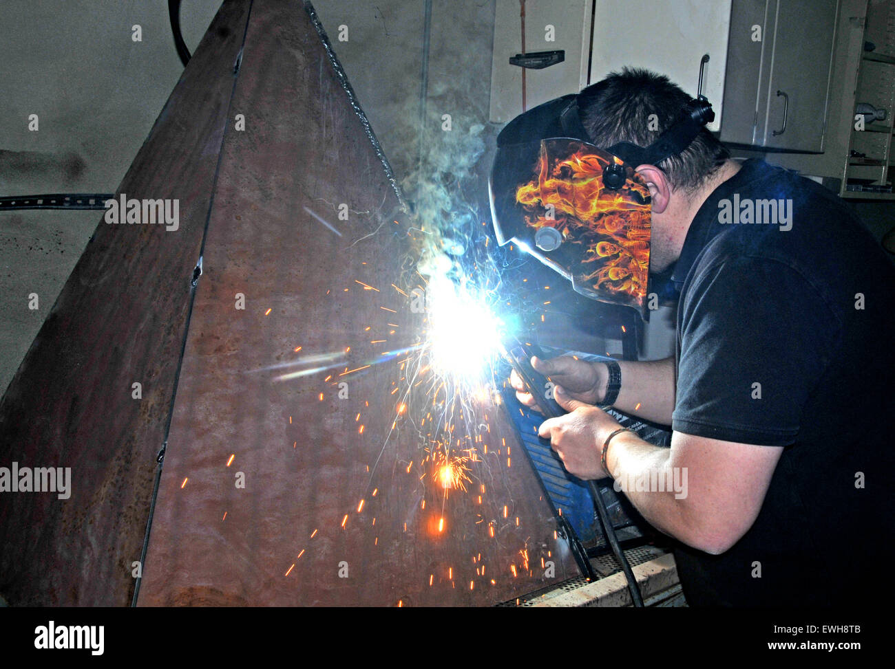 Man welding of steel plate Auvergne France Stock Photo
