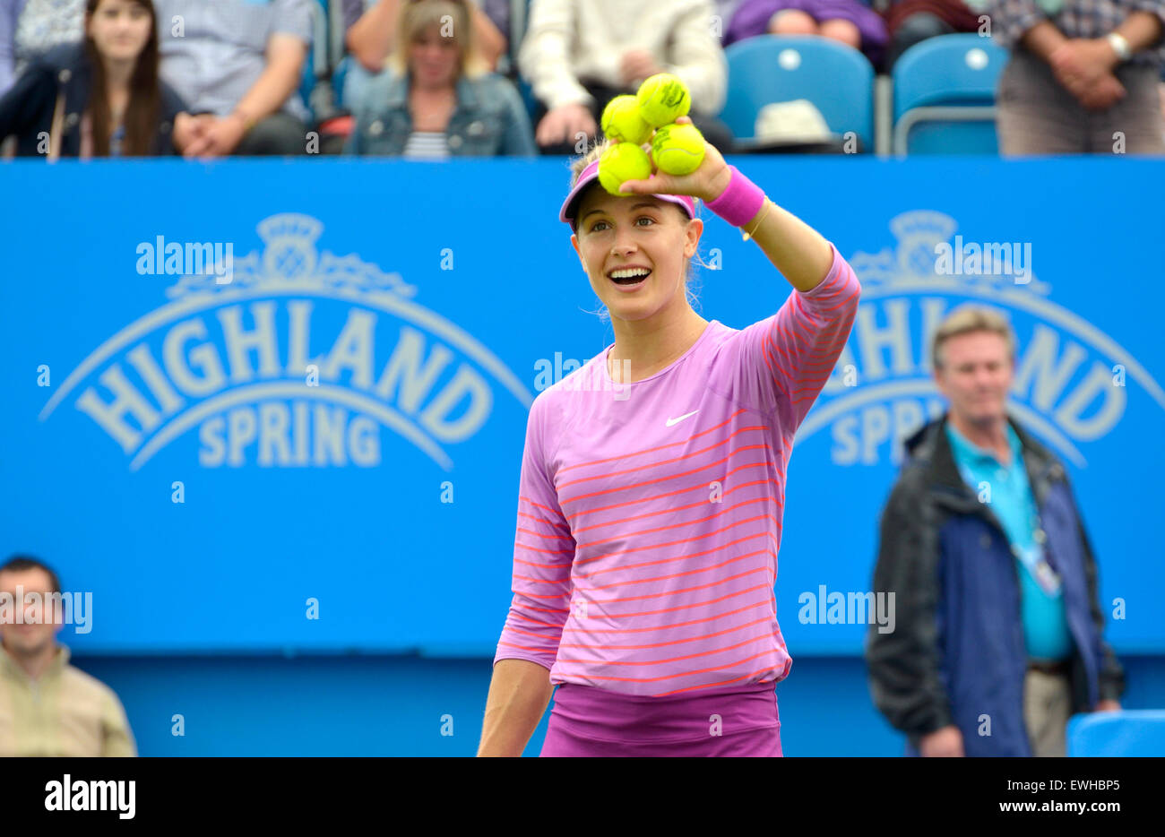 Eugenie Bouchard (Canada) with signed tennis balls to hit into the crowd after a win at