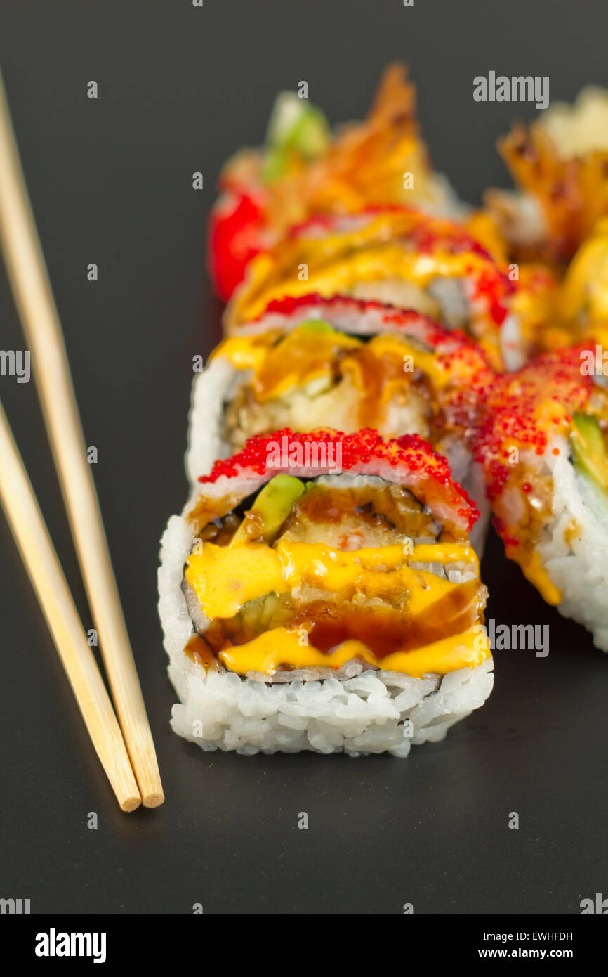 Beautiful fresh shrimp tempura sushi roll with tobiko and spicy mayonnaise Stock Photo Alamy