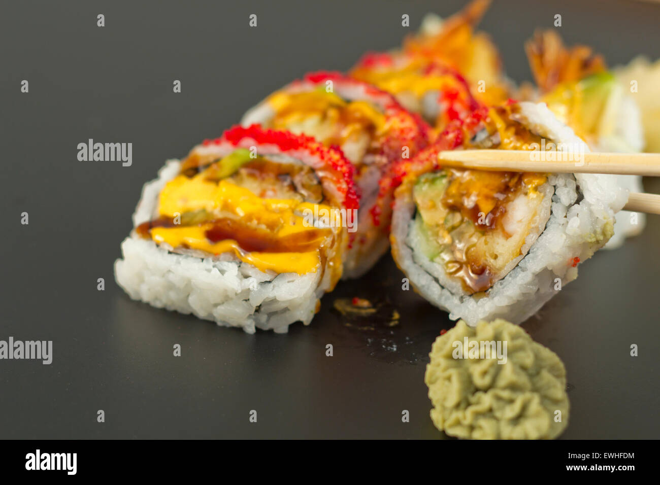 Beautiful fresh shrimp tempura sushi roll with tobiko and spicy mayonnaise Stock Photo Alamy