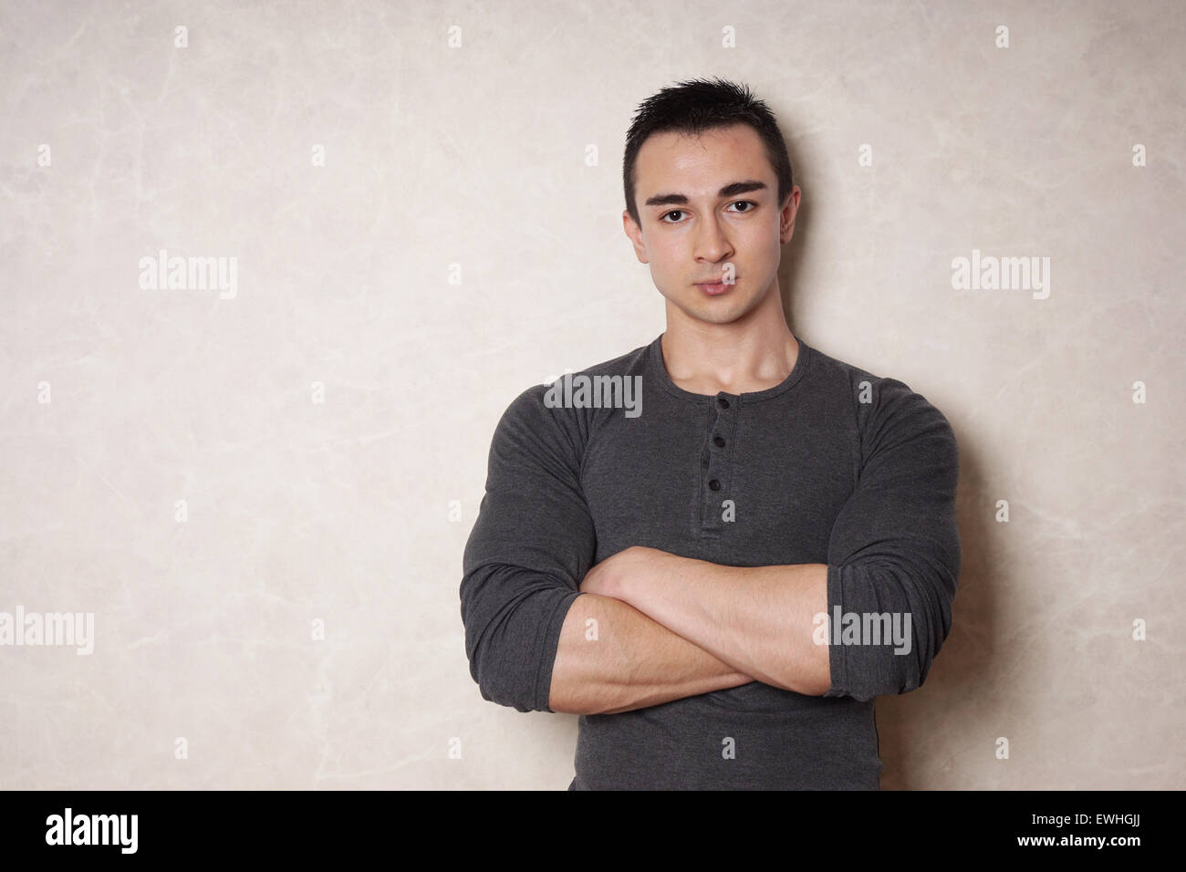 man with crossed arms Stock Photo