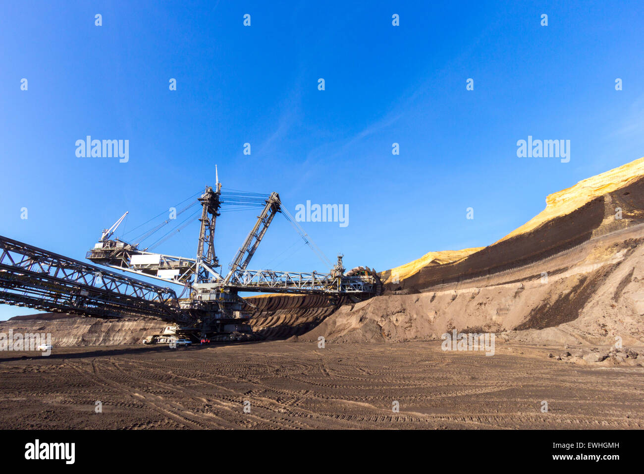 Giant wheel of bucket wheel excavator in a brown coal open pit mine. Stock Photo