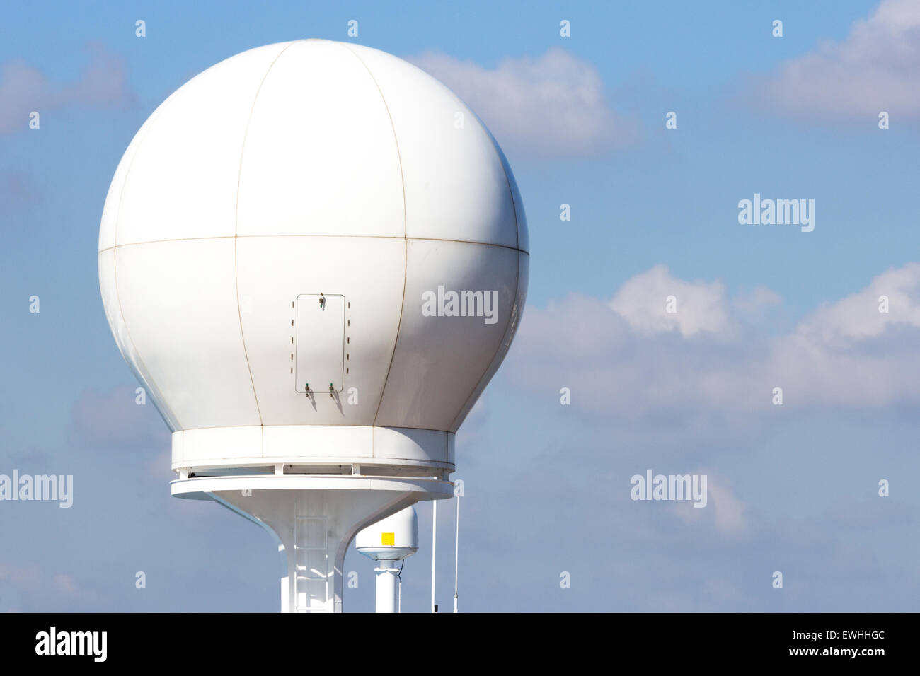 Ship radar dome. The dome protects the delicate electronics of the radar. Stock Photo