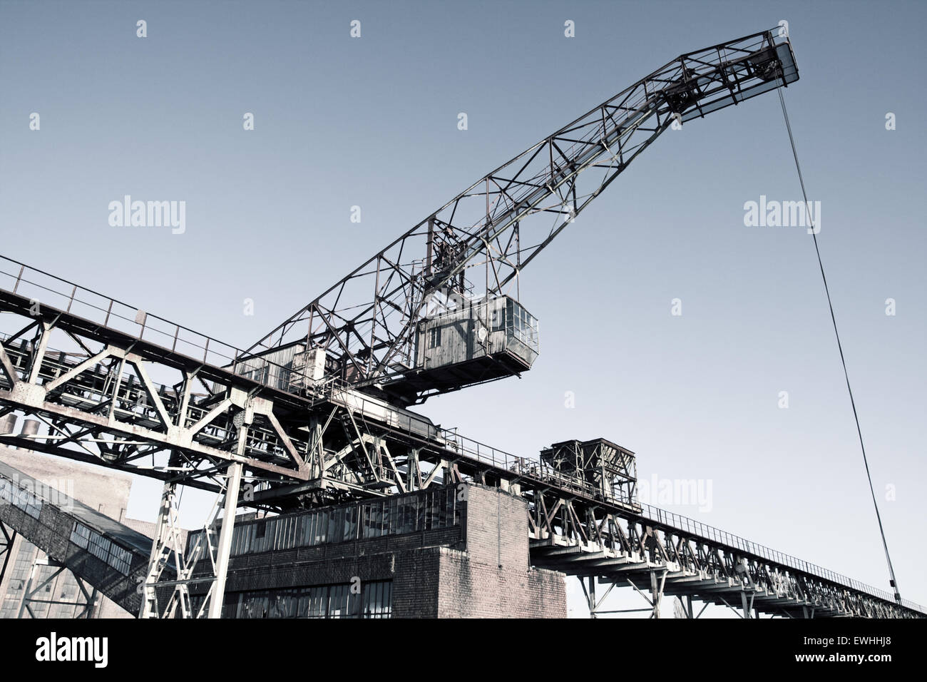 Old abandoned factory crane Stock Photo