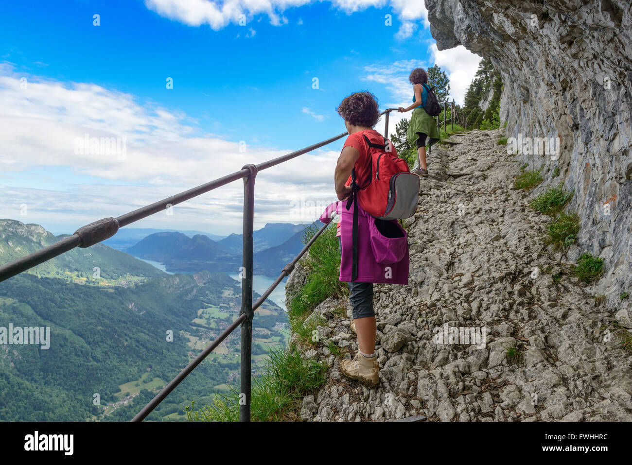 Two women hikers walking in the french mountains Stock Photo - Alamy