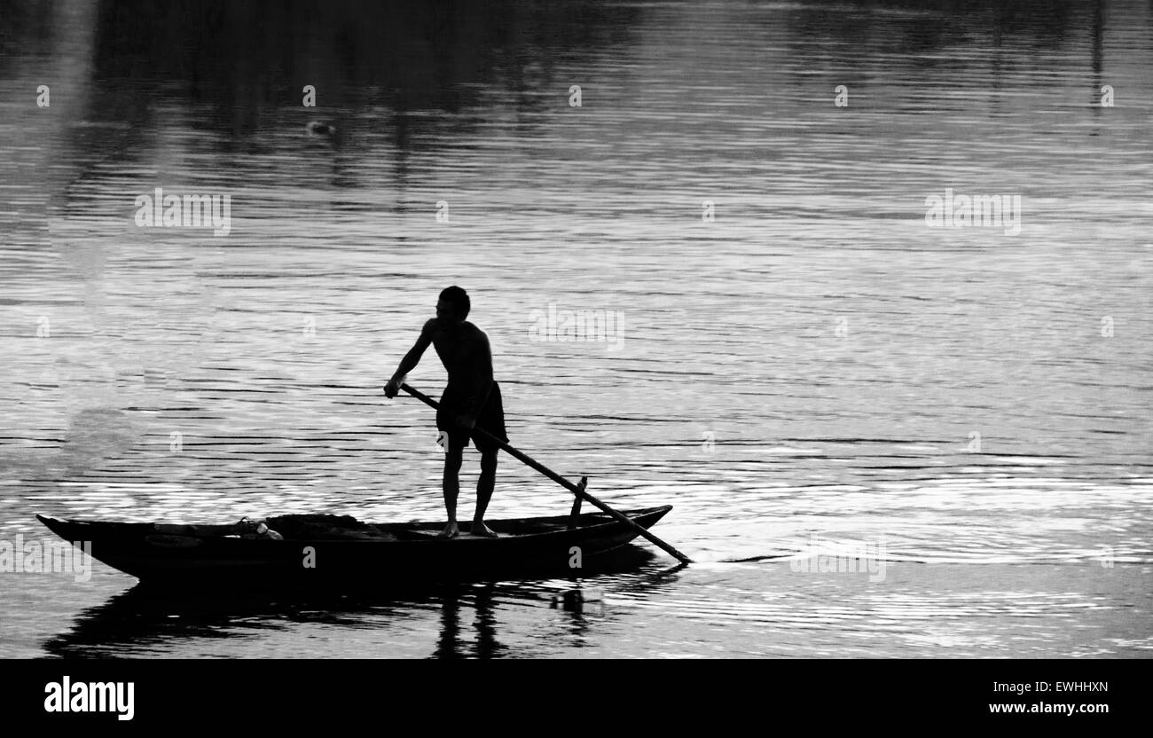 River boat in Asia delta waterway water fisherman Stock Photo