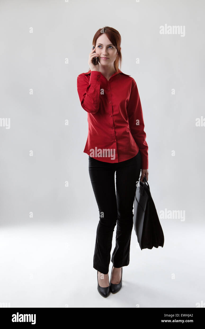 standing business woman shot in the studio Stock Photo - Alamy