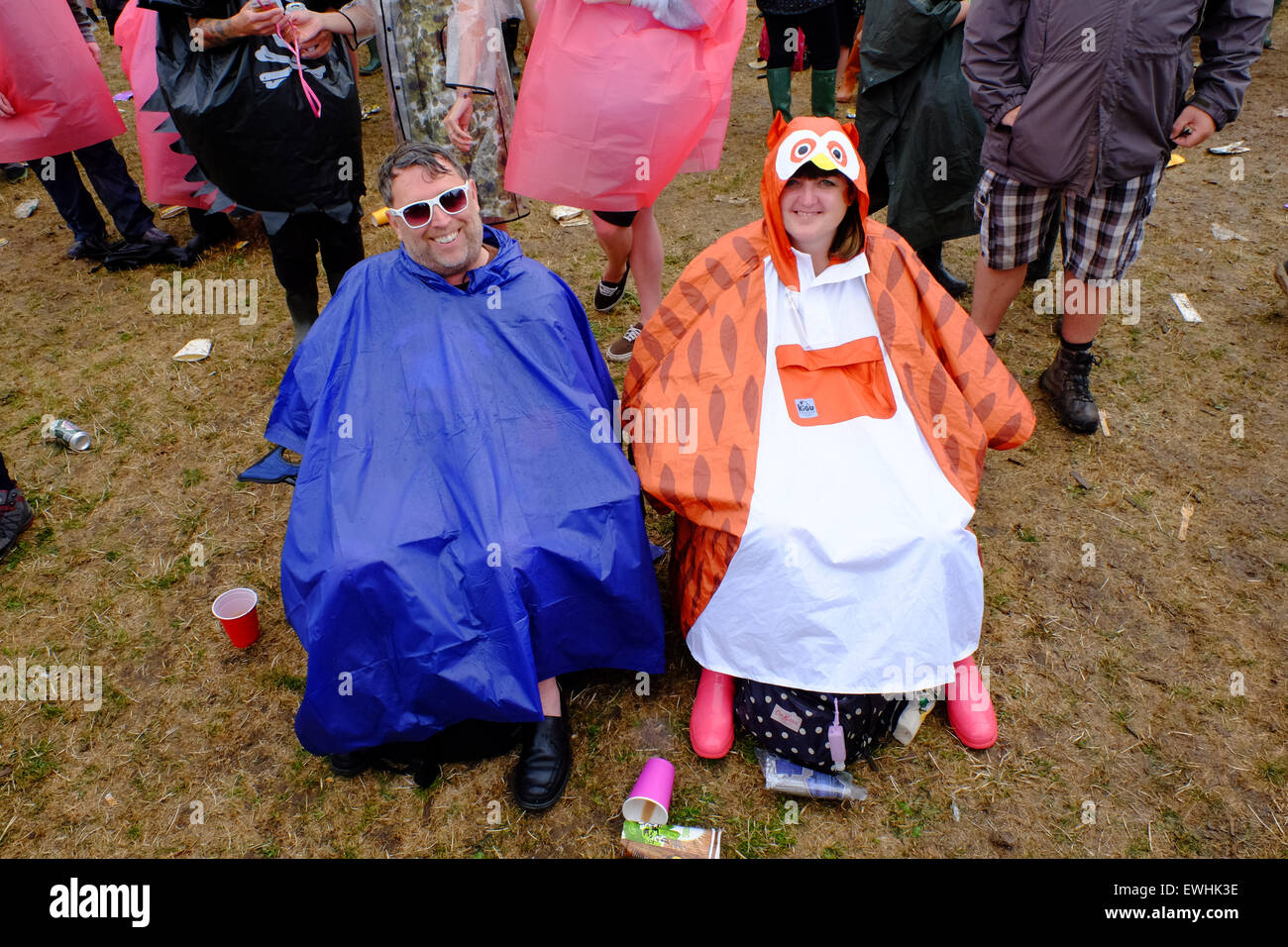 Glastonbury Festival, Somerset, UK. 26 June 2015. It would not be Glastonbury without some rain! Some are more prepared than others but spirits stay high and the music continues despite a heavy mid afternoon downpour. Credit:  Tom Corban/Alamy Live News Stock Photo