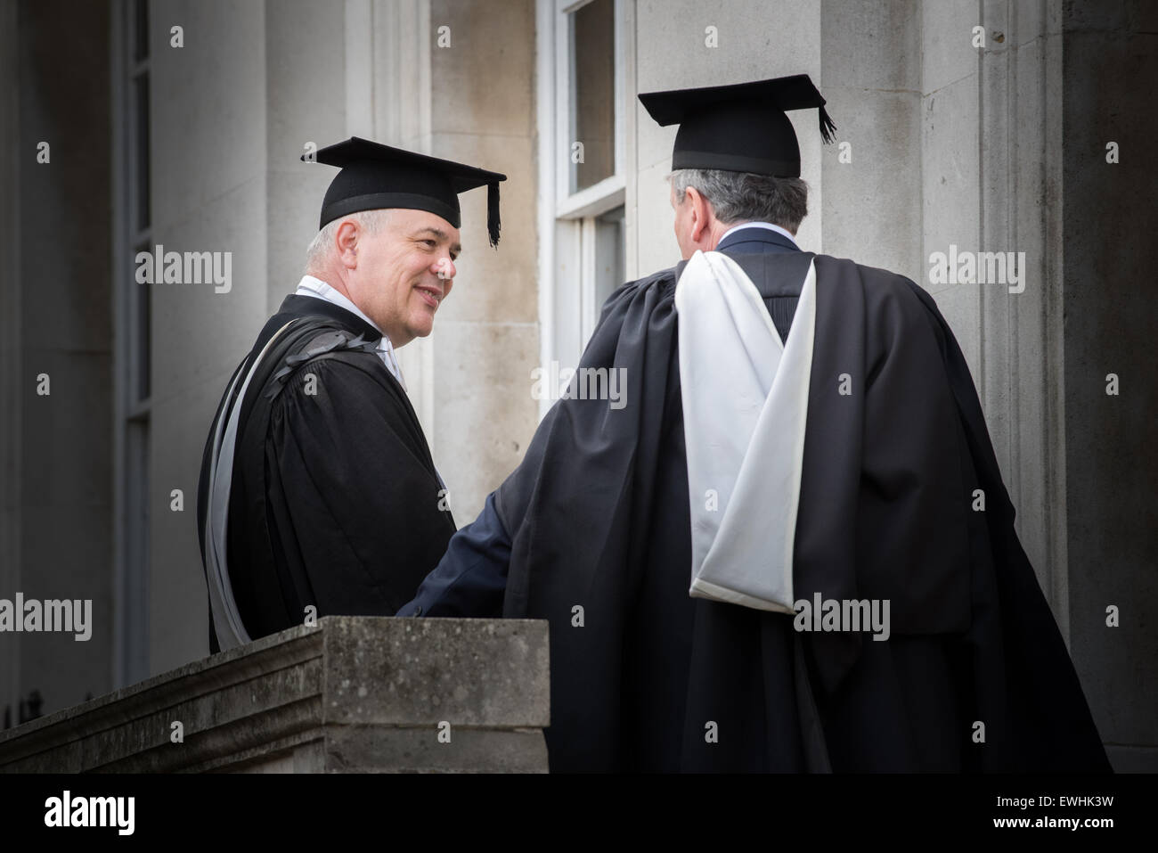 Cambridge, UK. 26th June, 2015. Senior tutors from Emmanuel college, Cambridge, England, wait outside Senate House on 25 june 2015 to congrratulate students from their college as they leave with their degree certificates. Credit:  miscellany/Alamy Live News Stock Photo