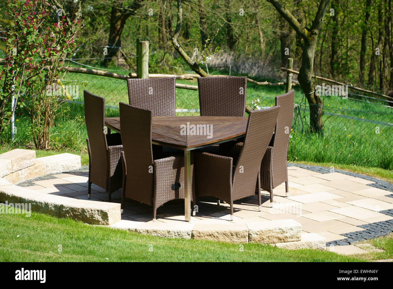 Garden furniture of rattan in the home garden Stock Photo Alamy