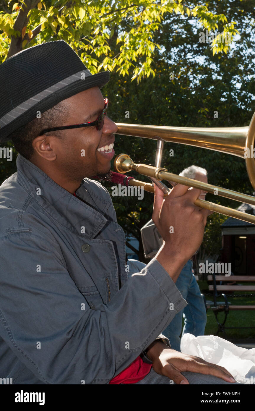 A saxophonist in Washington Square Park in Greenwich Village Park. This