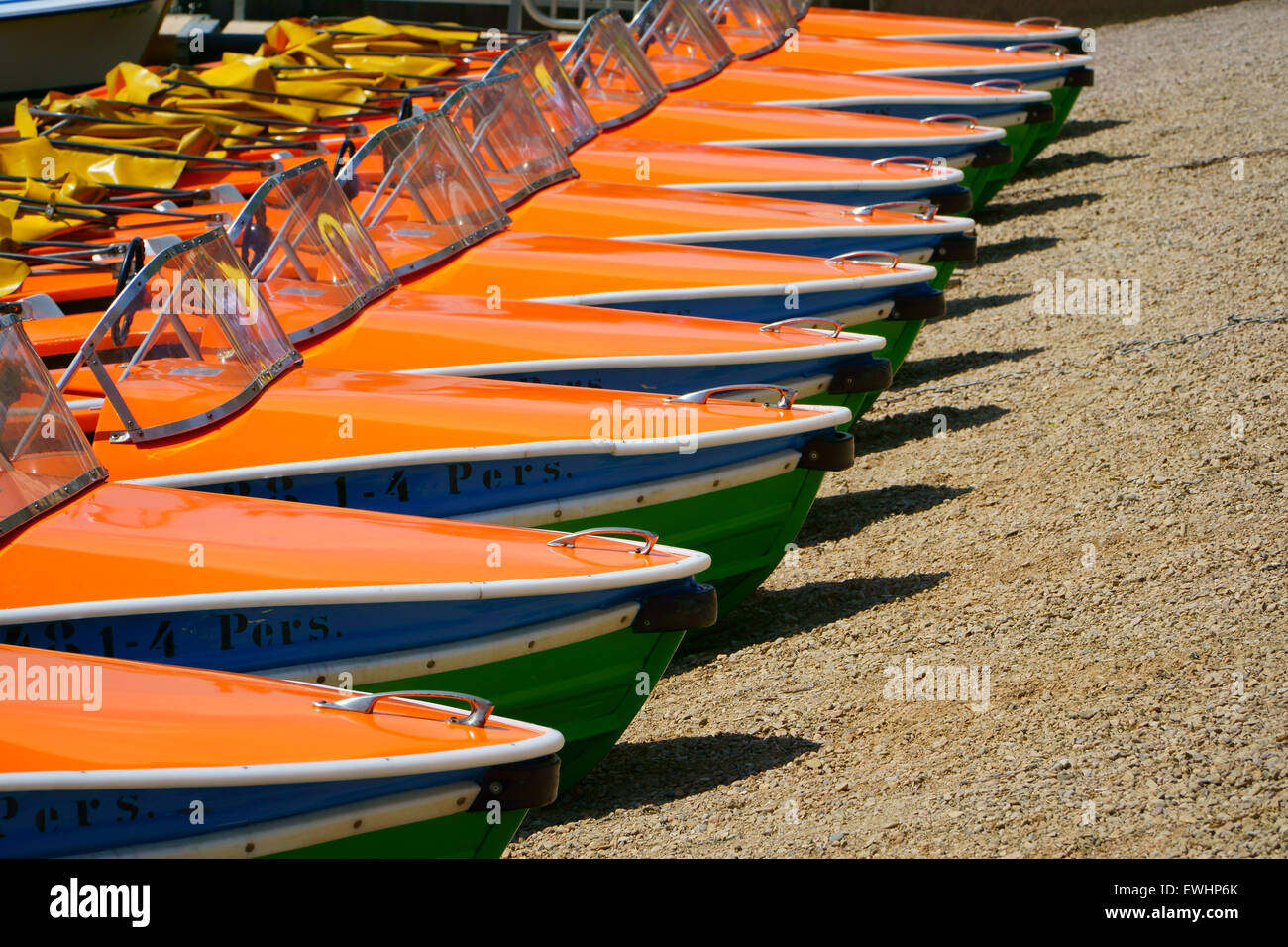 Pedal boats in a row at the shore of the Titisee Stock Photo Alamy