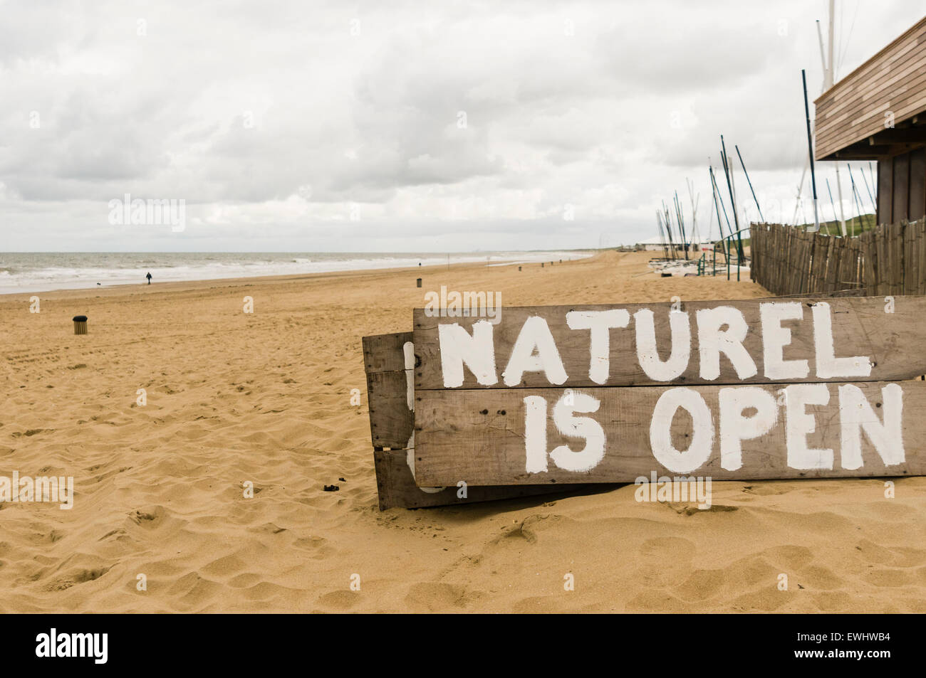 Sign advising people that the Naturel Beachclub is open, Scheveningen, The Hague, Netherlands Stock Photo