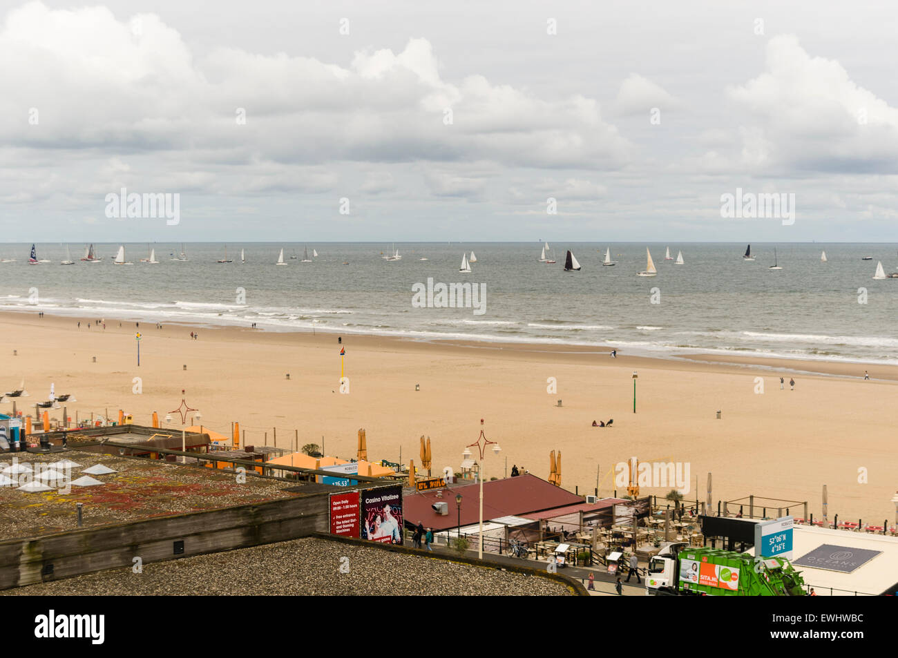 Many yachts sailing alongside Scheveningen Strand Stock Photo