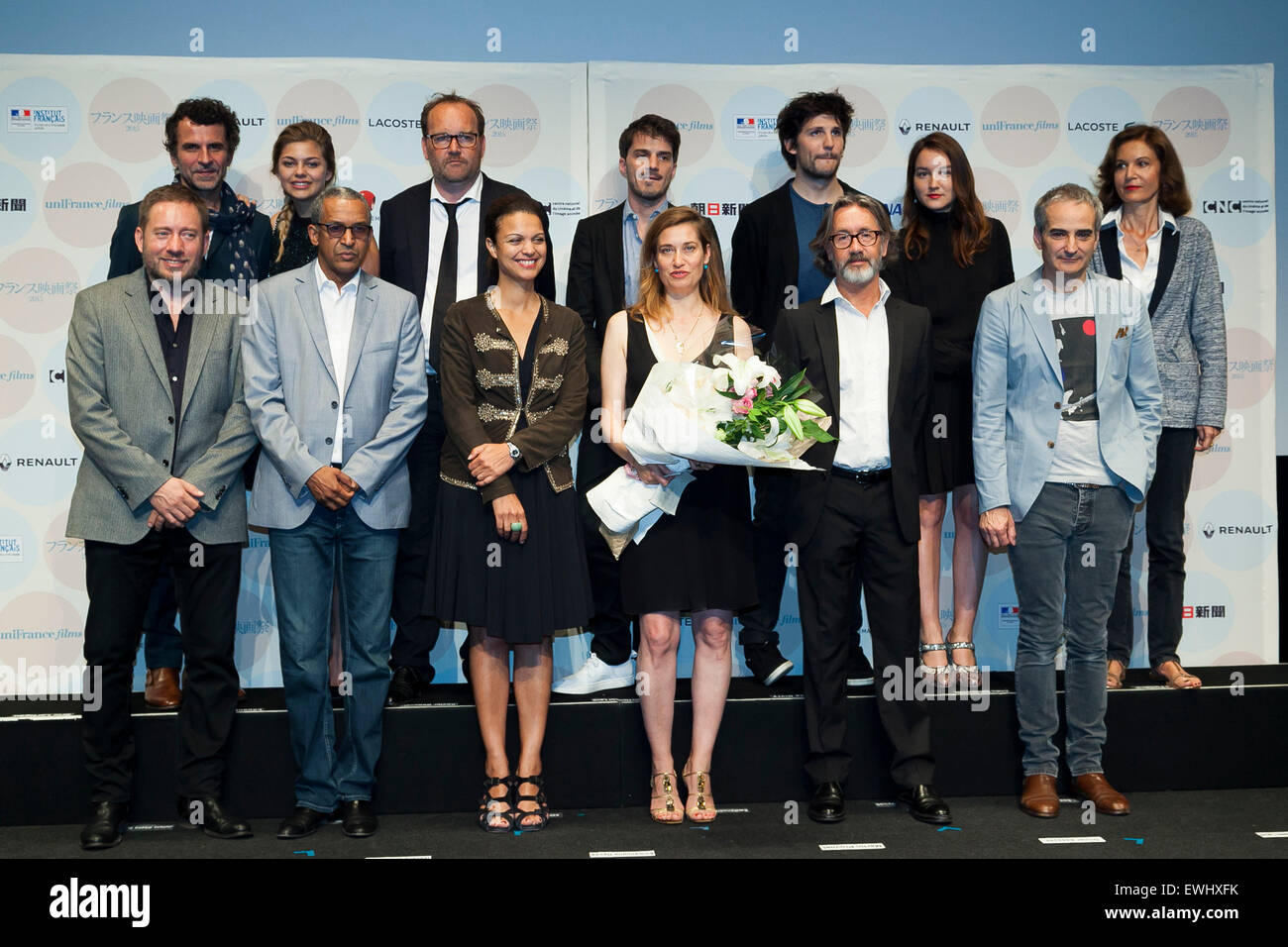 Tokyo, Japan. 26th June, 2015. (L to R) Erick Lartigau, Louane Emera, Xavier Beauvois, Sven Hansen-Love, Felix de Givry, Anais Demoustier, Anne Fontaine, Juliano Ribeiro, Abderrahmane Sissako, Emmanuelle Devos, Martin Provost pose for the cameras during the opening ceremony of the Festival du Film Francais au Japon 2015 on June 26, 2015, Tokyo, Japan. This year 12 movies will be screened during the festival from June 26th to 29th. Credit:  Rodrigo Reyes Marin/AFLO/Alamy Live News Stock Photo