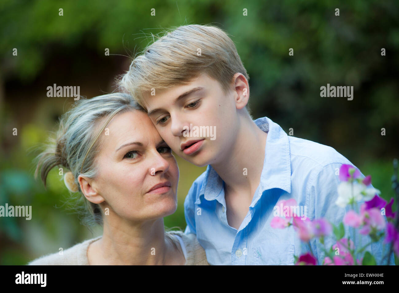 A mother and son share a touching moment in their garden in London Stock Photo Alamy A mother and son share a touching moment in their garden in London Stock Photo Alamy