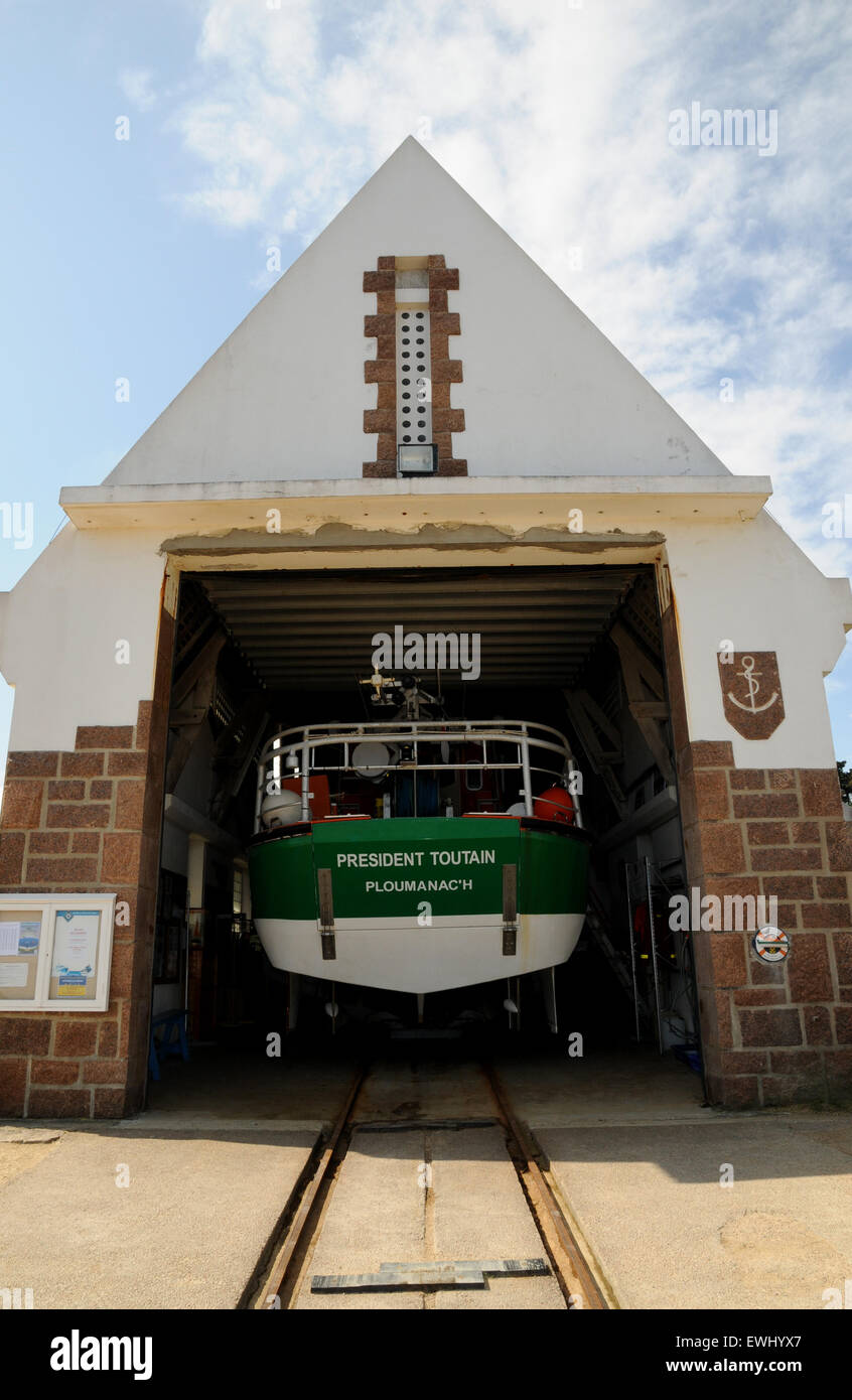 The lifeboat station and its launching slipway at Ploumanac'h on the rocky north Brittany coast. Stock Photo