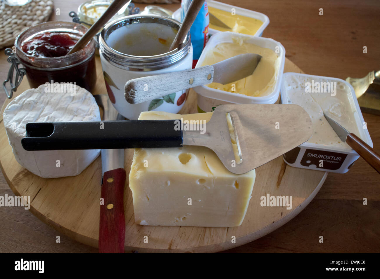 selection of cheeses and spreads for breakfast in a guest house Iceland Stock Photo