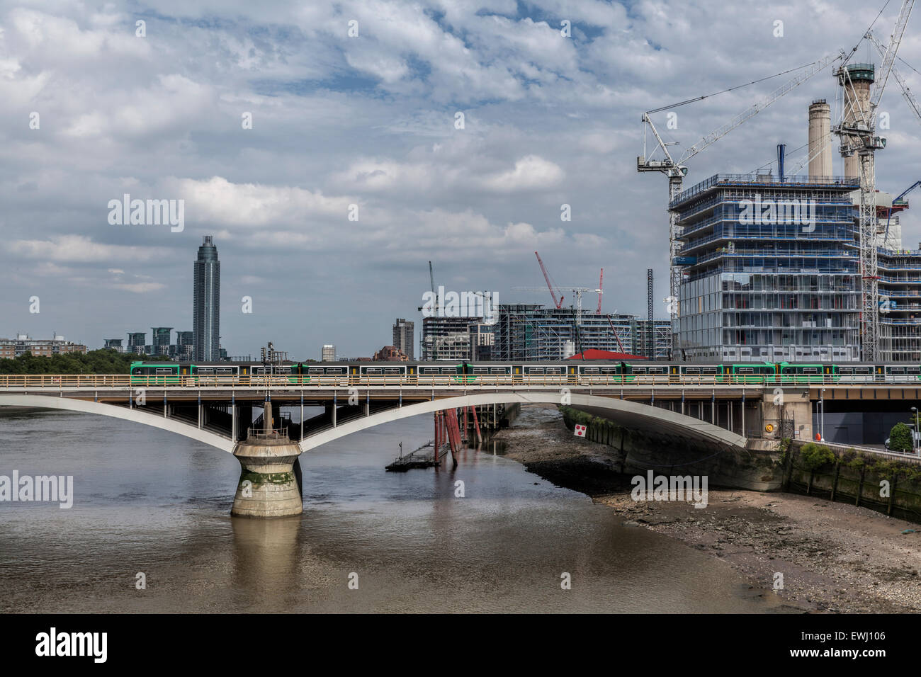Battersea Park Bridge with a train going over the River Thames and