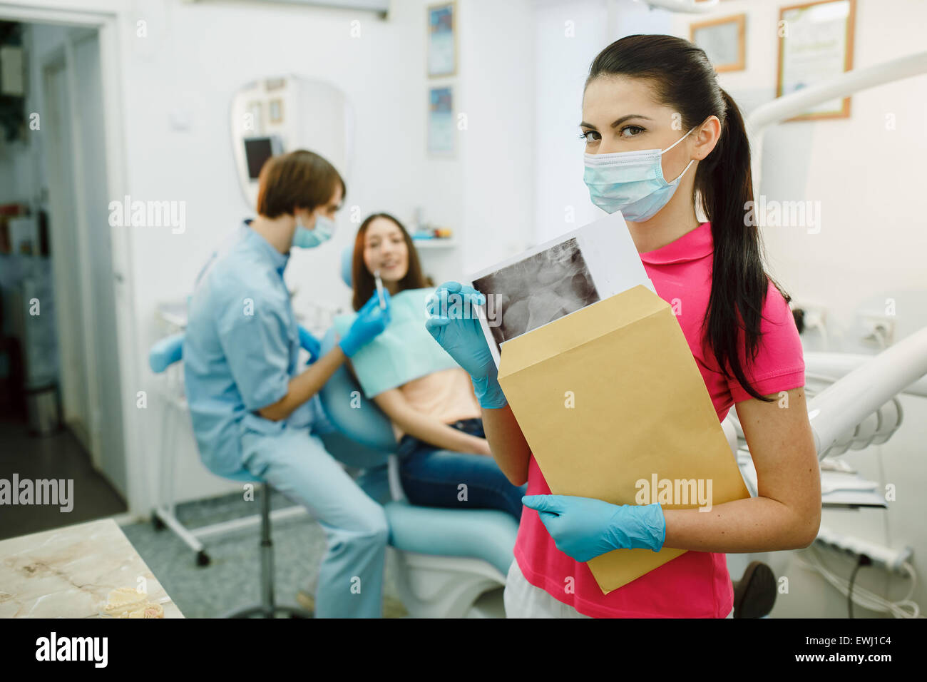 Dentist with Xrays in the hands of Stock Photo Alamy