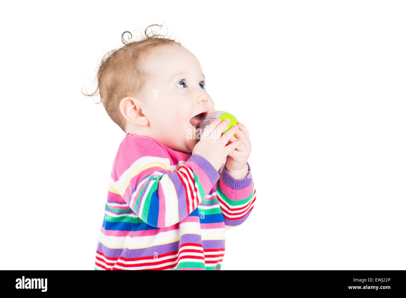 Sweet baby girl in a pink striped dress, isolated on white Stock Photo ...