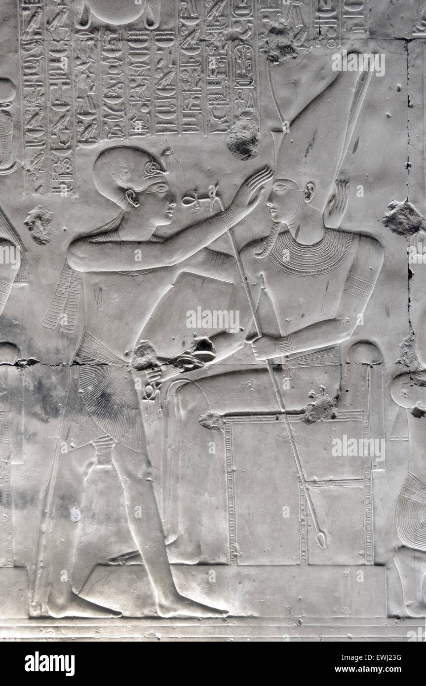 Abydos,Egypt, the mortuary temple of pharaoh Seti I, Menmaatra, (XIX° dyn. 1321-1186 B.C.) - The pharaoh blessing the god Osiris Stock Photo