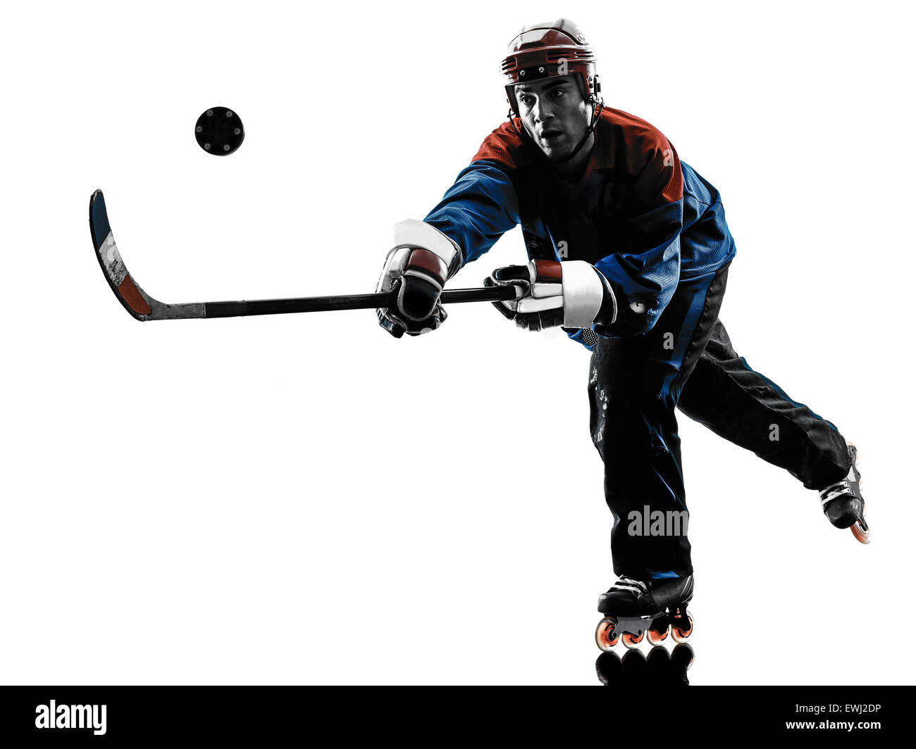 one caucasian man hockey player  in studio  silhouette isolated on white background Stock Photo