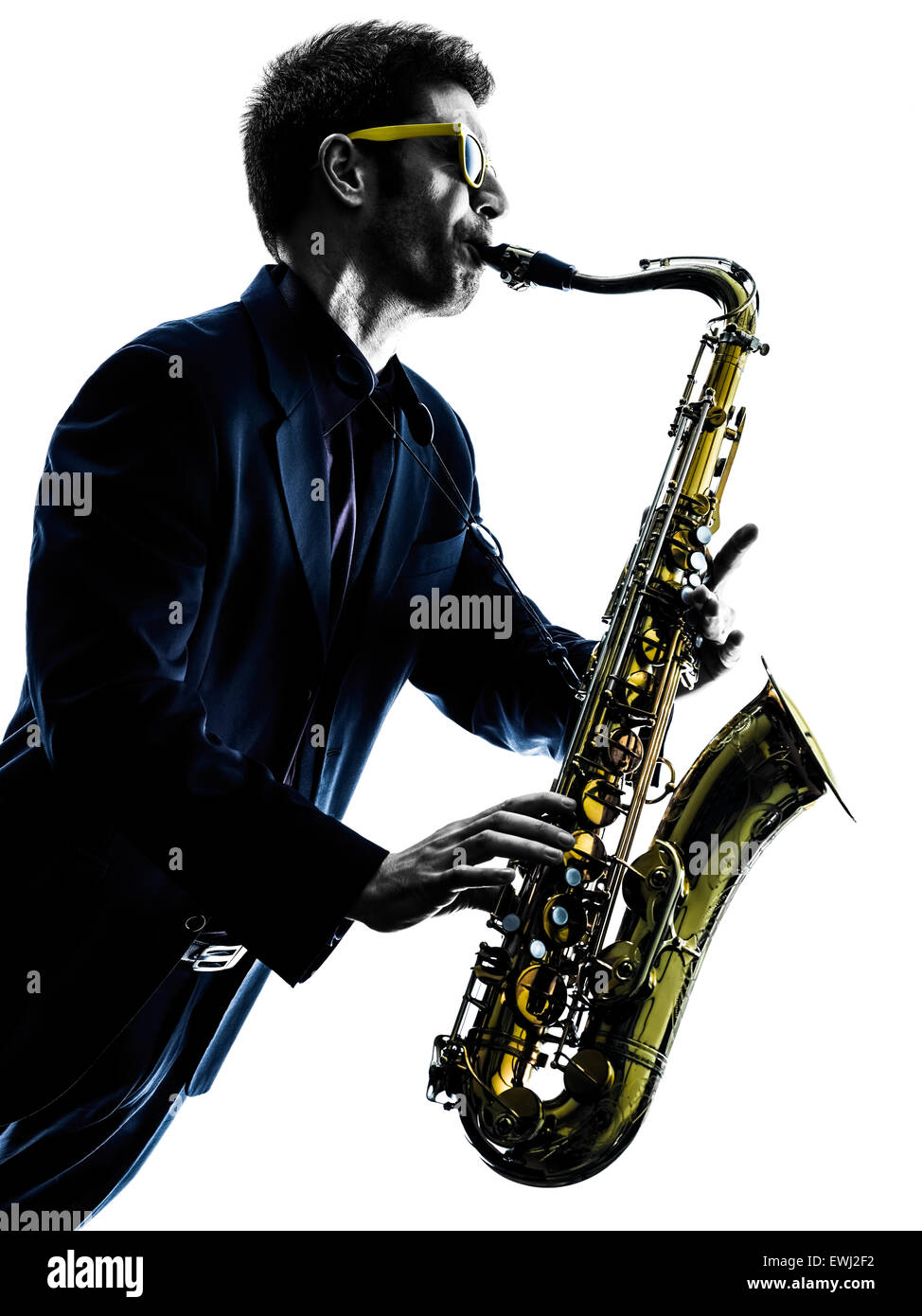 one caucasian man  saxophonist playing saxophone player in studio silhouette isolated on white background Stock Photo