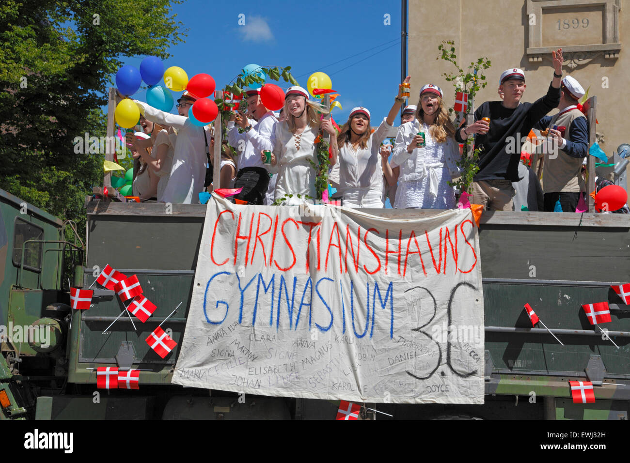 Christianshavn, Copenhagen, Denmark. June 26, 2015. Danish students celebrate their high school, grammar school graduation. Students from Christianshavns Gymnasium (high school) have just started on the traditional, long, exhausting and high-spirited truck tour of celebration visiting each student’s   home for refreshments. Credit:  Niels Quist/Alamy Live News Stock Photo