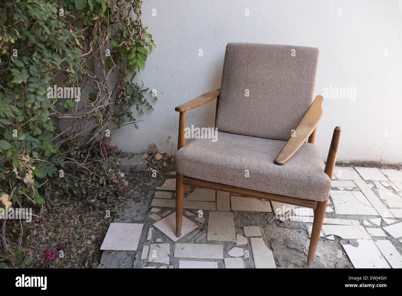 broken old chair,arm rest broken Stock Photo Alamy
